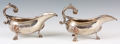 Lot 309 - A PAIR OF SILVER SHEFFIELD PLATE SAUCE BOATS...