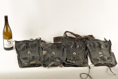 Lot 34 - A SET OF FOUR UNUSED LEATHER WEFCO SPRING GAITERS