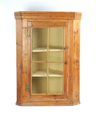 Lot 329 - A 19TH CENTURY GLAZED PINE CORNER CUPBOARD