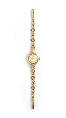 Lot 94 - A TISSOT 9CT LADIES WATCH