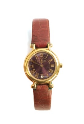 Lot 101 - A RAYMOND WEIL 18CT GOLDPLATED LADIES WATCH PURPLE DIAL MODEL 9936