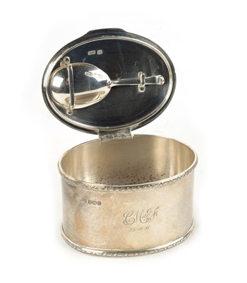 Lot 121 - A FINNIGANS 1940 SILVER TEA CADDY AND SPOON