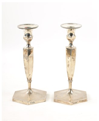 Lot 423 - A PAIR OF SILVER CANDLESTICKS