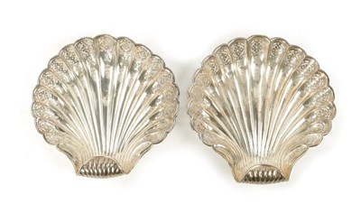 Lot 290 - A PAIR OF EDWARD VII SILVER PIERCED ENGRAVED SCOLLOP SHELL BON BON DISHES