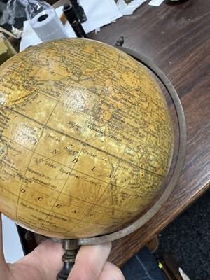 Lot 140 - AN EARLY 20TH CENTURY 6” TERRESTRIAL GLOBE ON STAND