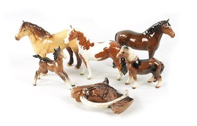 Lot 62 - OF EQUESTRIAN INTEREST A COLLECTION OF CERAMIC HORSES AND HORSEHEAD