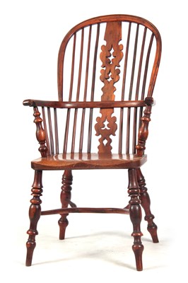 Lot 953 - AN EARLY 19TH CENTURY HIGH BACK YEW WOOD WINDSOR ARMCHAIR