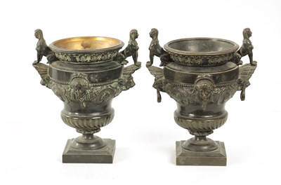 Lot 426 - A PAIR OF LATE 19TH CENTURY CAST BRONZE EGYPTIAN STYLE URNS