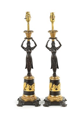 Lot 465 - A PAIR OF LATE 19TH CENTURY REGENCY STYLE BRONZE AND ORMOLU MOUNTED FIGURAL LAMP BASES