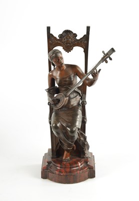 Lot 185 - A 19TH CENTURY PATINATED METAL AND ROUGE MARBLE SCULPTURE