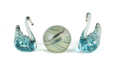 Lot 1 - A PAIR OF TURQUOISE GLASS SWANS AND A SPHERICAL GLASS PAPERWEIGHT