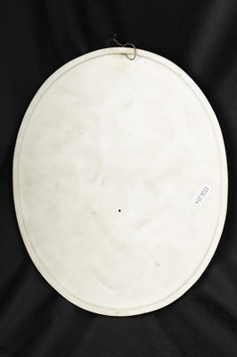 Lot 60 - A GERMAN BISQUE PORCELAIN OVAL WALL PLAQUE