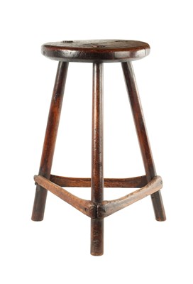 Lot 352 - A EARLY ELM AND FRUITWOOD CIRCULAR STOOL