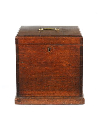 Lot 342 - A GEORGE III  LINED FOUR DIVISIONAL OAK DECANTER BOX WITH BRASS HANDLE