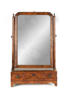 Lot 957 - A GEORGE I CROSS BANDED AND HERRING BAND STRUNG FIGURED WALNUT DRESSING TABLE MIRROR