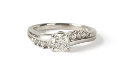 Lot 208 - A 0.54CT DIAMOND AND 18CT WHITE GOLD SOLITAIRE RING