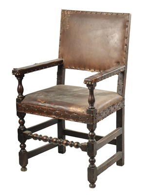 Lot 51 - AN EARLY JOINED OAK LEATHER UPHOLSTERED ARMCHAIR