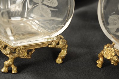 Lot 30 - A PAIR OF 19TH CENTURY FRENCH ROCK CRYSTAL ORMOLU MOUNTED VASES