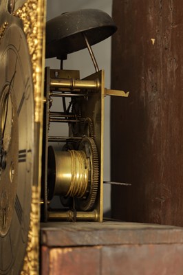 Lot 678 - JOHN BENSON, WHITEHAVEN. A GEORGE III FIGURED MAHOGANY EIGHT-DAY BRASS DIAL MOON ROLLER LONGCASE CLOCK