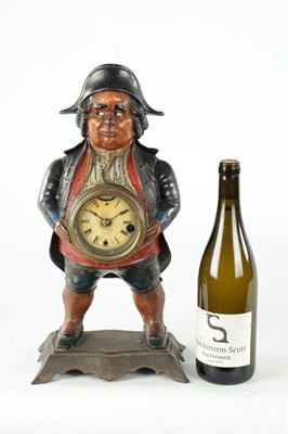 Lot 1370 - AN AMERICAN POLYCHROME PAINTED CAST IRON FIGURAL BLINKING EYE "CONTINENTAL MODEL" MANTEL TIMEPIECE
