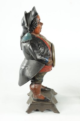 Lot 686 - AN AMERICAN POLYCHROME PAINTED CAST IRON FIGURAL BLINKING EYE "CONTINENTAL MODEL" MANTEL TIMEPIECE