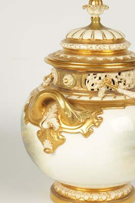 Lot 33 - JOHN STINTON. A FINE RICHLY GILT, RELIEF MOULDED TWO HANDLED BULBOUS BLUSHED IVORY POT POURRI CABINET VASE AND COVER