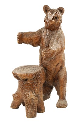 Lot 345 - A GOOD 19TH CENTURY CARVED LINDEN WOOD BLACK FOREST BEAR STOOL