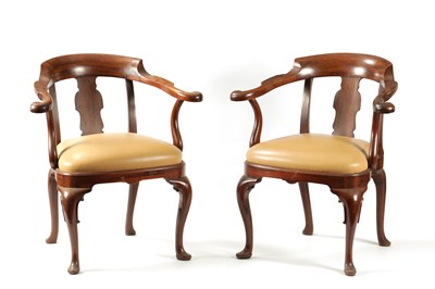 Lot 951 - AN UNUSUAL PAIR OF GEORGE II STYLE MAHOGANY SMOKERS BOW ARMCHAIRS