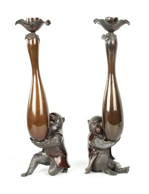 Lot 139 - A FINE PAIR OF JAPANESE MEIJI PATINATED BRONZE FIGURAL CANDLESTICKS