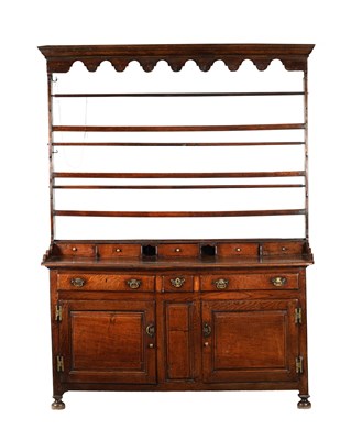 Lot 870 - AN EARLY 18TH CENTURY CUMBRIAN JOINED OAK DRESSER AND RACK
