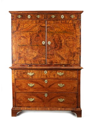 Lot 1425 - A WILLIAM AND MARY CROSS-BANDED AND GEOMETRICALLY INLAID FIGURED WALNUT CABINET ON CHEST