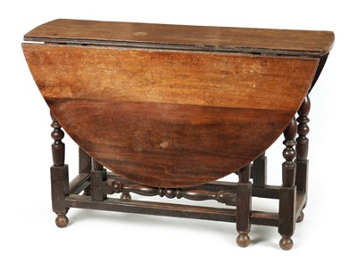 Lot 1283 - A 17TH CENTURY WALNUT GATE LEG TABLE