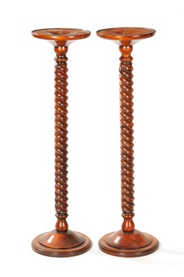 Lot 930 - A PAIR OF TWISTED FRUITWOOD CANDLE HOLDERS