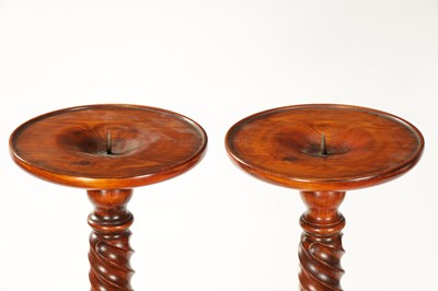 Lot 930 - A PAIR OF TWISTED FRUITWOOD CANDLE HOLDERS