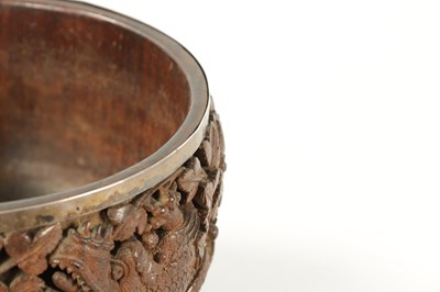 Lot 84 - A LATE 19TH CENTURY BURMESE CARVED HARDWOOD SILVER MOUNTED BOWL