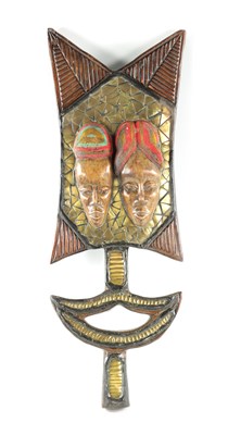 Lot 188 - AN AFRICAN POLYCHROME DECORATED CARVING