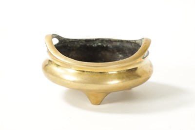 Lot 97 - AN EARLY CHINESE CAST BRONZE CENSOR WITH STAND