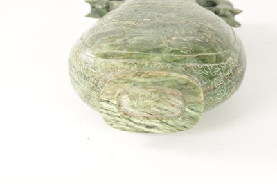 Lot 98 - A LARGE CHINESE SPINACH-GREEN JADE TWO-HANDLED VASE