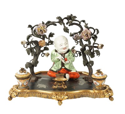 Lot 434 - A 19TH CENTURY CONTINENTAL ORMOLU, LACQUERWORK AND PORCELAIN PEN AND INK STAND