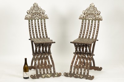 Lot 67 - A PAIR OF 19TH CENTURY ISLAMIC OTTOMAN HARDWOOD AND MOTHER OF PEARL INLAID FOLDING CHAIRS