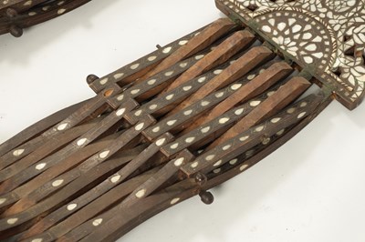 Lot 67 - A PAIR OF 19TH CENTURY ISLAMIC OTTOMAN HARDWOOD AND MOTHER OF PEARL INLAID FOLDING CHAIRS