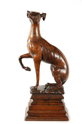 Lot 351 - A GOOD 19TH CENTURY CARVED WALNUT OVER-SIZED SCULPTURE OF A SEATED GREYHOUND