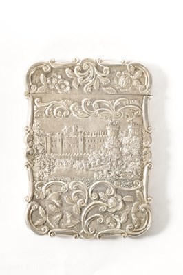 Lot 302 - A NATHANIEL MILLS VICTORIAN SILVER CARD CASE EMBOSSED WITH WARWICK AND WINDSOR CASTLES