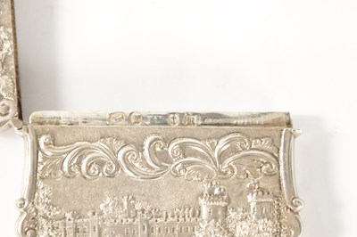 Lot 302 - A NATHANIEL MILLS VICTORIAN SILVER CARD CASE EMBOSSED WITH WARWICK AND WINDSOR CASTLES