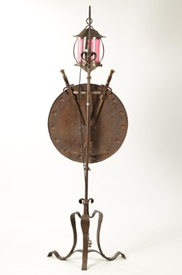 Lot 786 - A STYLISH ARTS AND CRAFTS PLANISHED COPPER AND STEEL ADJUSTABLE STANDARD LAMP