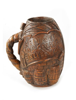 Lot 203 - A LARGE LATE 19TH CENTURY GERMAN CARVED WOOD ALE JUG