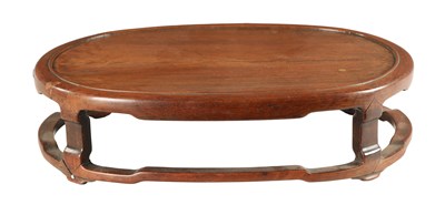 Lot 604 - A 19TH CENTURY CHINESE HARDWOOD OVAL SHAPED JARDINIERE STAND