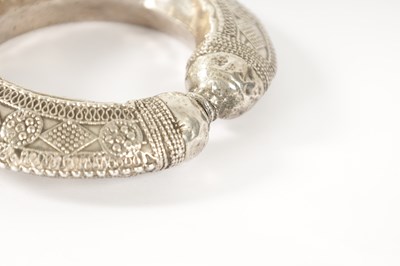 Lot 4 - A 19TH CENTURY SILVER AFRICAN TRIBAL BANGLE