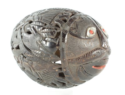 Lot 132 - AN EARLY 19TH CENTURY EASTERN CARVED COCONUT BUGBEAR MONEYBOX