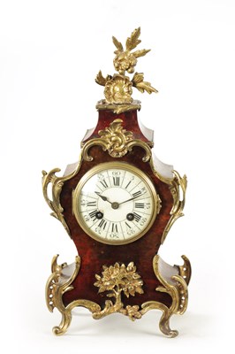 Lot 721 - A 19TH CENTURY FRENCH TORTOISESHELL AND ORMOLU MOUNTED MANTEL CLOCK